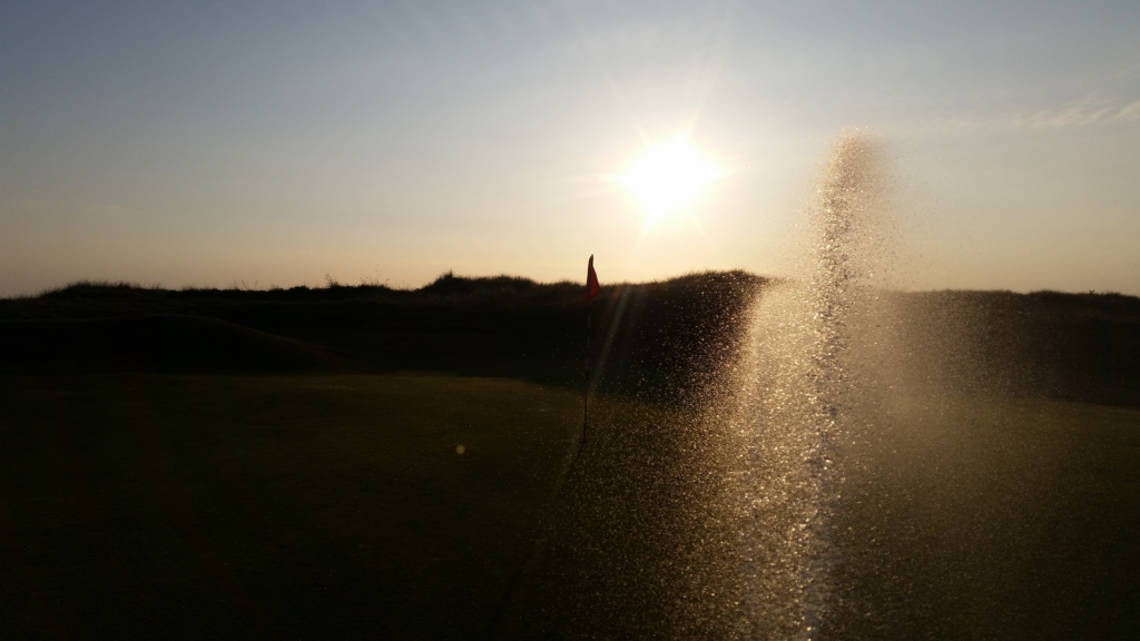 Hand-watering dry spots on greens for a couple of hours in the evenings is never a chore. That sun is getting low in this picture and it looks like the sunset will be world-class. An image of that is tacked onto the end of this report, for no reason other than it is stunning.